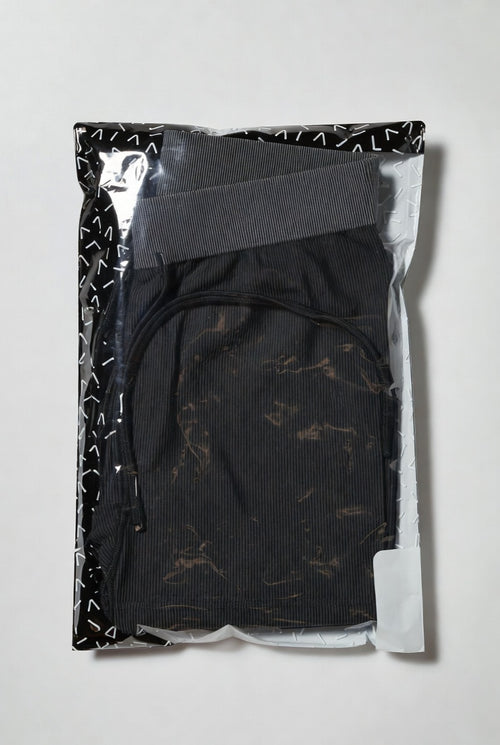 Pair of black Leggings sport elastic yoga leggings with a high waistband, designed for comfortable activewear.