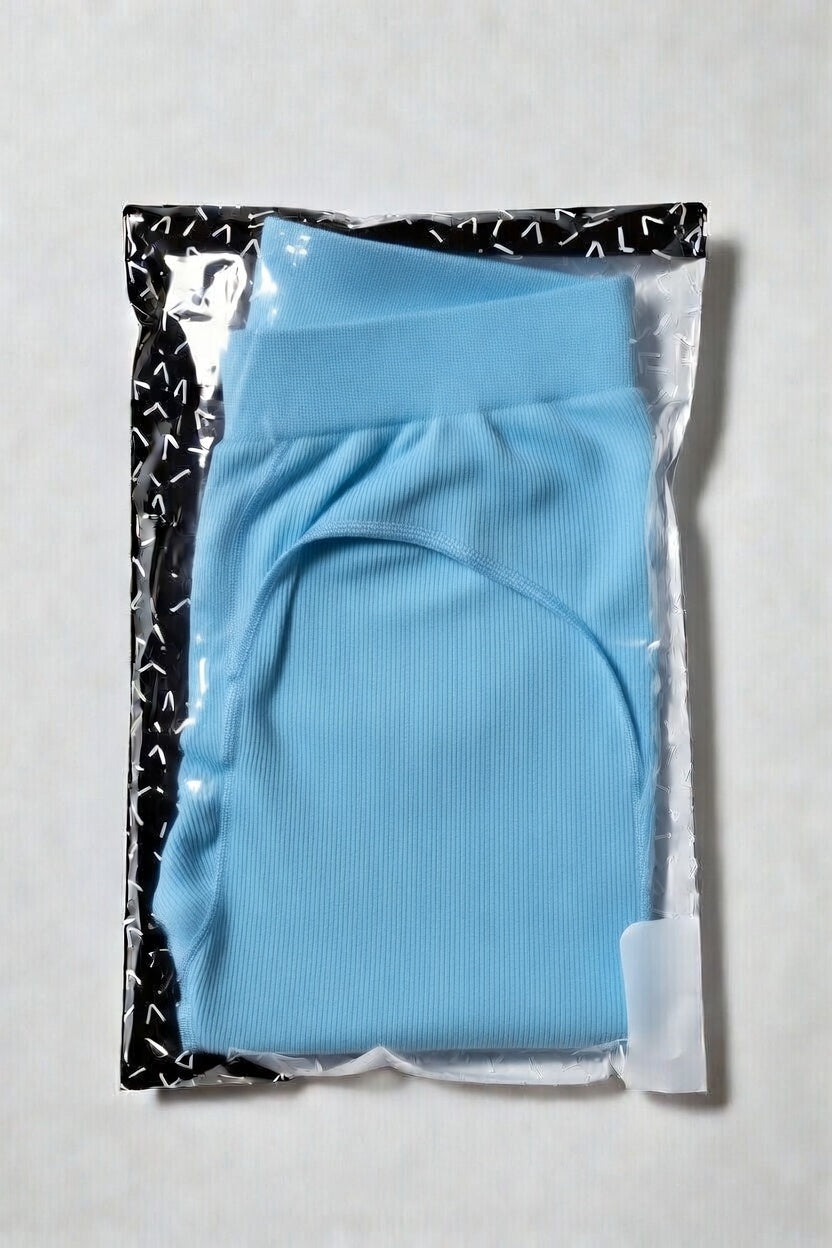 Pair of black sport yoga leggings with elastic waistband, designed for active wear and flexible movement.